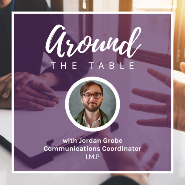 Jordan Grobe's headshot, superimposed over a designed background featuring two people sitting at a table.