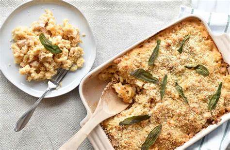 A baking dish of creamy mac and cheese topped with crispy buttery breadcrumbs.