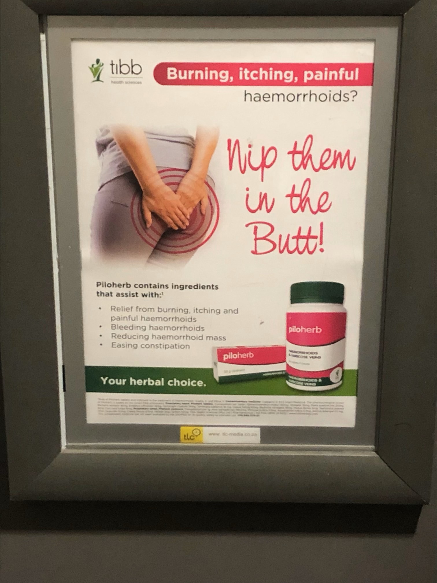 Ad featuring a person covering their backside with their hands with red circles highlighting the area The text reads Nip them in the Butt