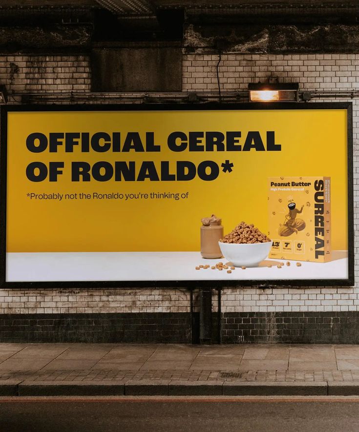 Billboard with large bold text that reads Official Cereal of Ronaldo followed by smaller text that says Probably not the Ronaldo youre thinking of