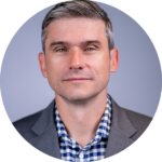 A circular headshot of Albert.