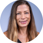 A circular headshot of Carolee.