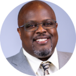 A circular headshot of Jesse.