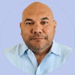 A circular headshot of Rigoberto